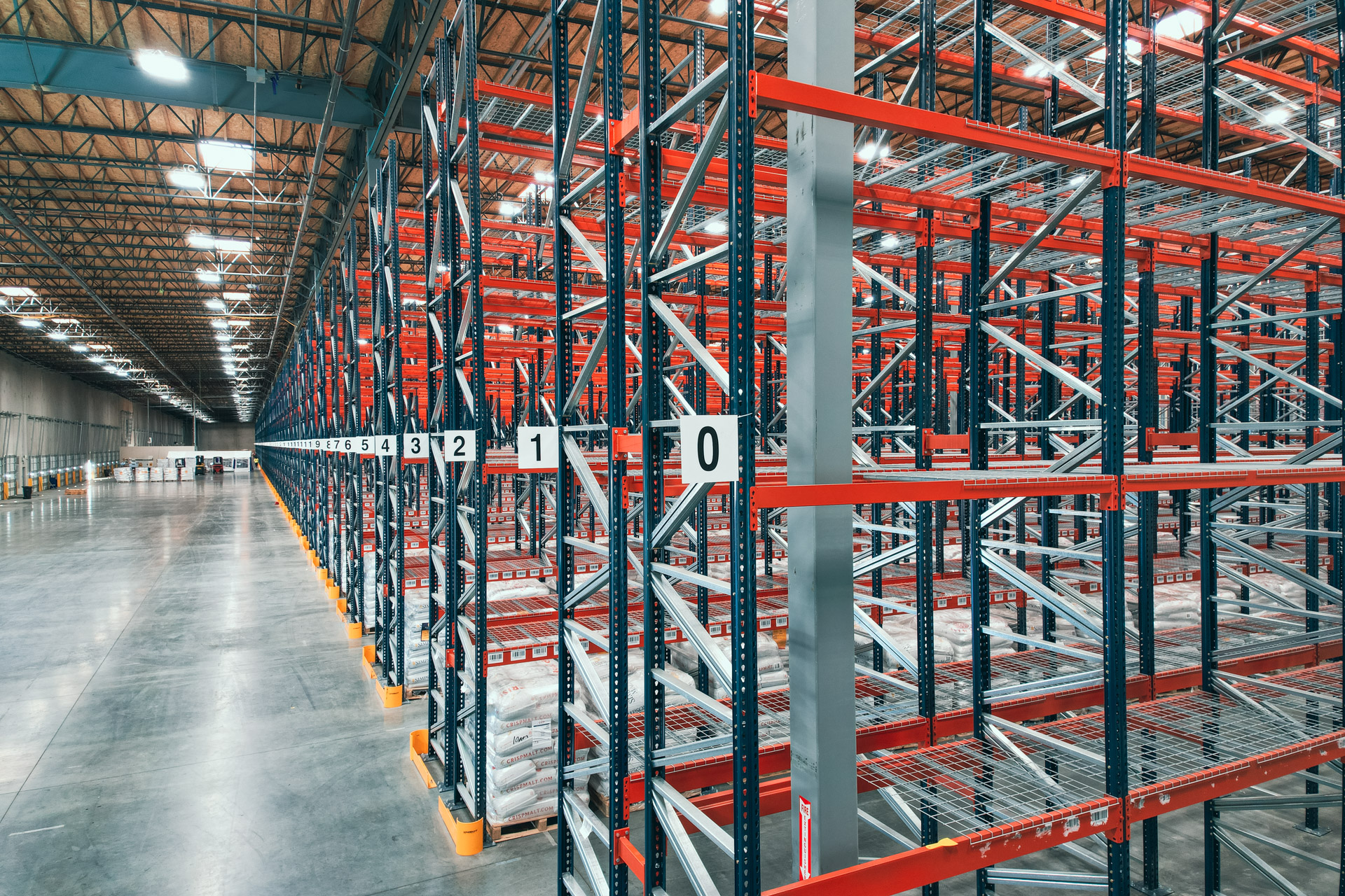 Pallet rack rows in a warehouse serving Calhoun, GA